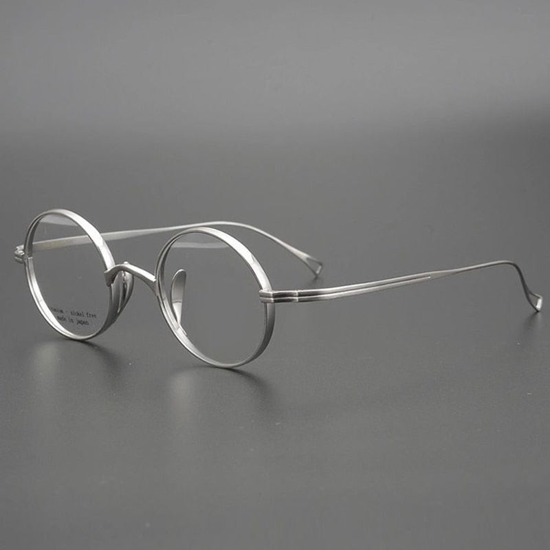 Montura redonda de titanio de estilo retro para gafas graduadas