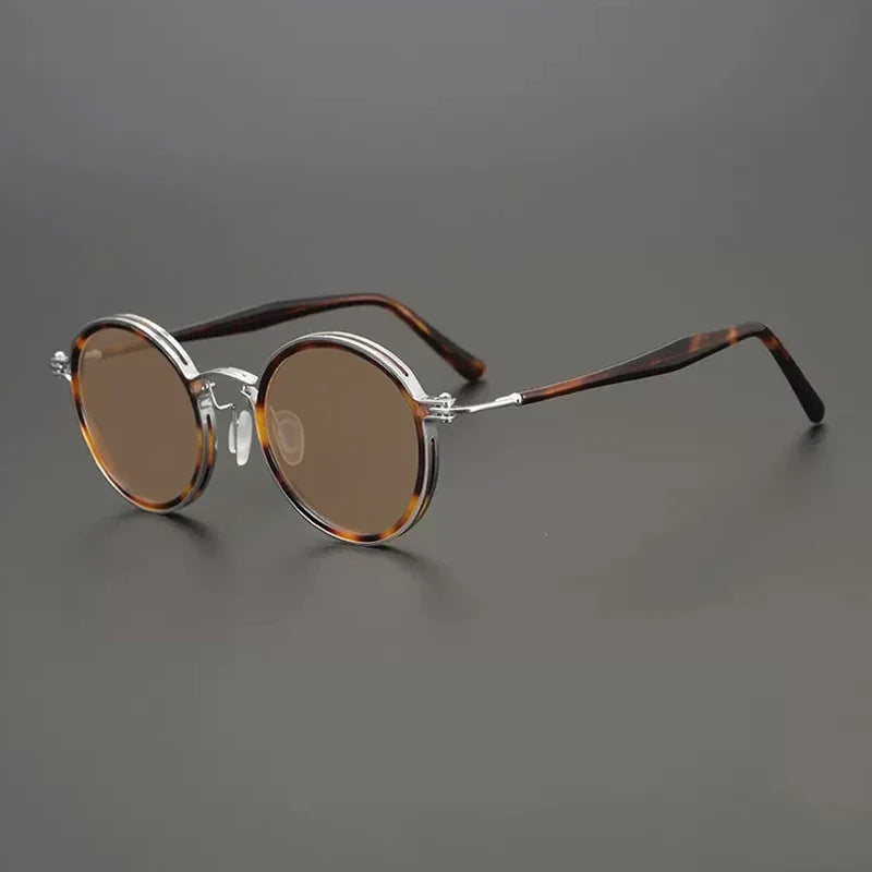 Gafas de sol redondas vintage polarizadas con protección UV400 y detalle de titanio