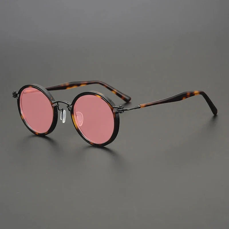 Gafas de sol redondas vintage polarizadas con protección UV400 y detalle de titanio