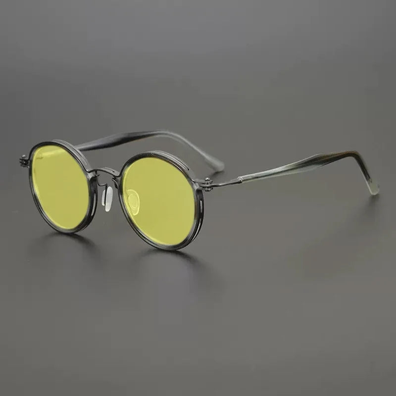 Gafas de sol redondas vintage polarizadas con protección UV400 y detalle de titanio