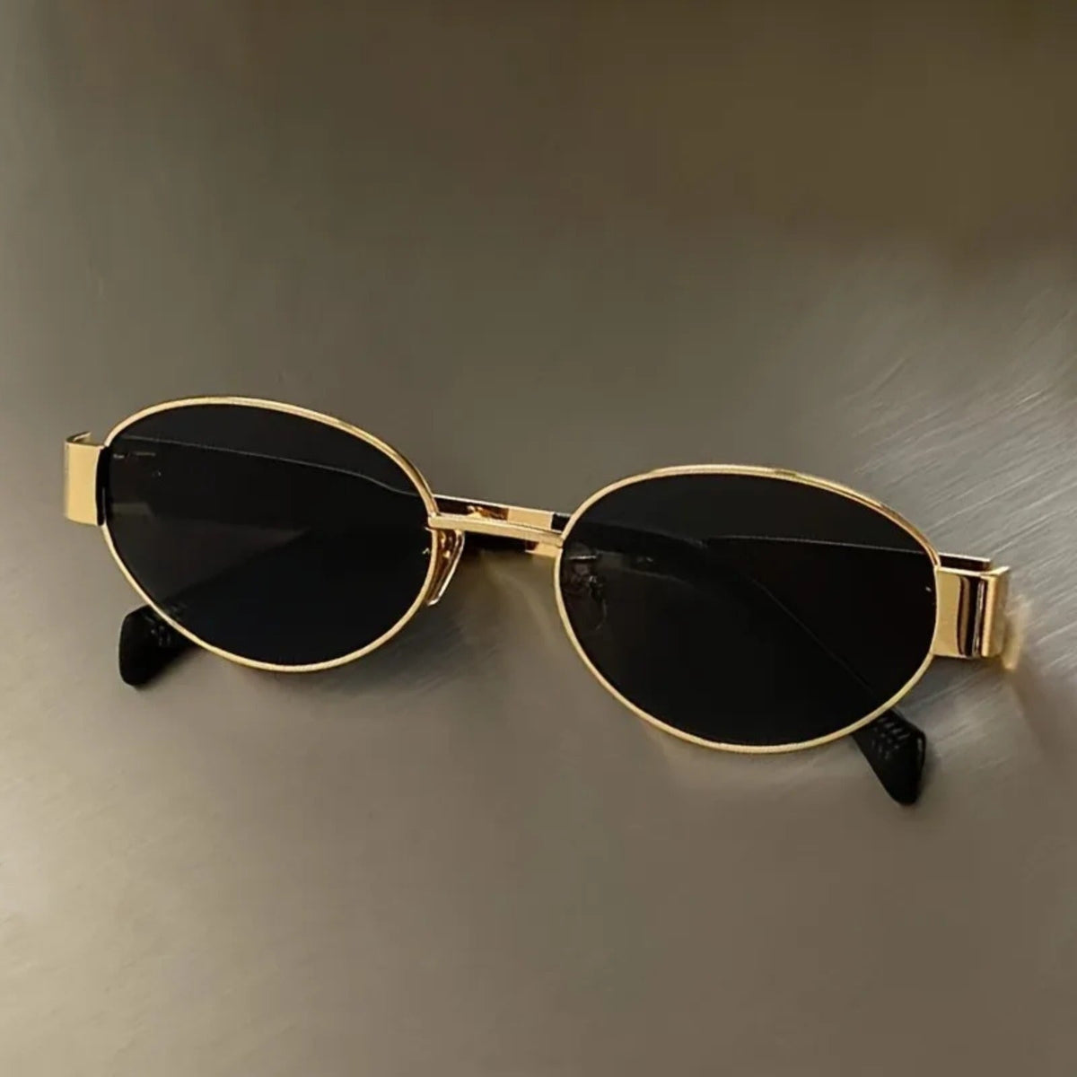 Gafas de sol ovaladas de aleación dorada con protección UV400