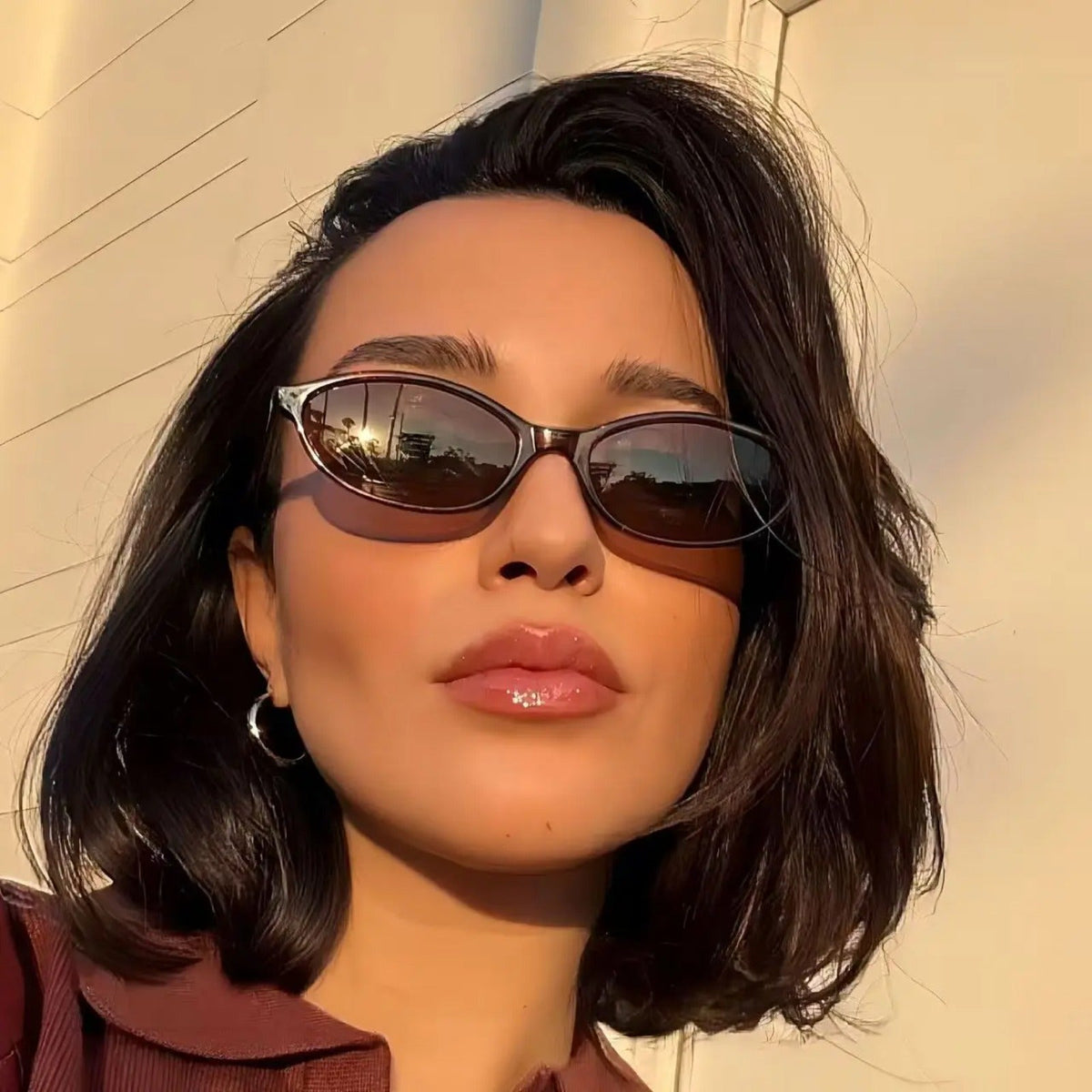 Gafas de sol de plástico pequeñas estilo ojo de gato con protección UV400