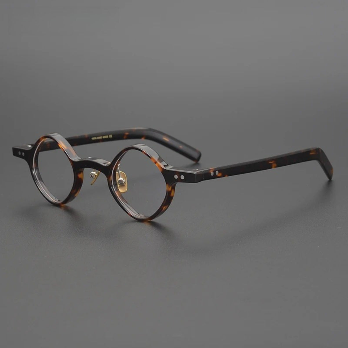 Montura redonda de acetato con diseño patchwork