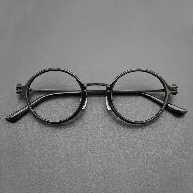 Gafas redondas de acetato y titanio