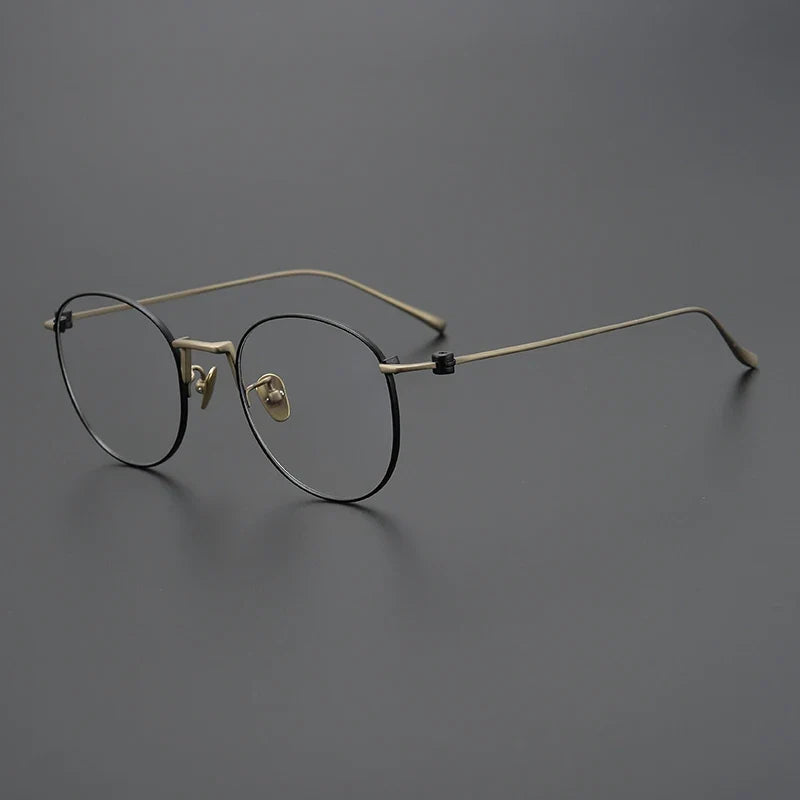 Gafas redondas de alambre de titanio