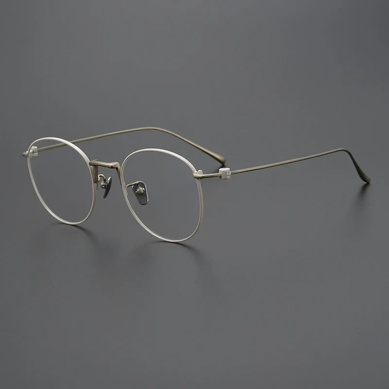 Gafas redondas de alambre de titanio