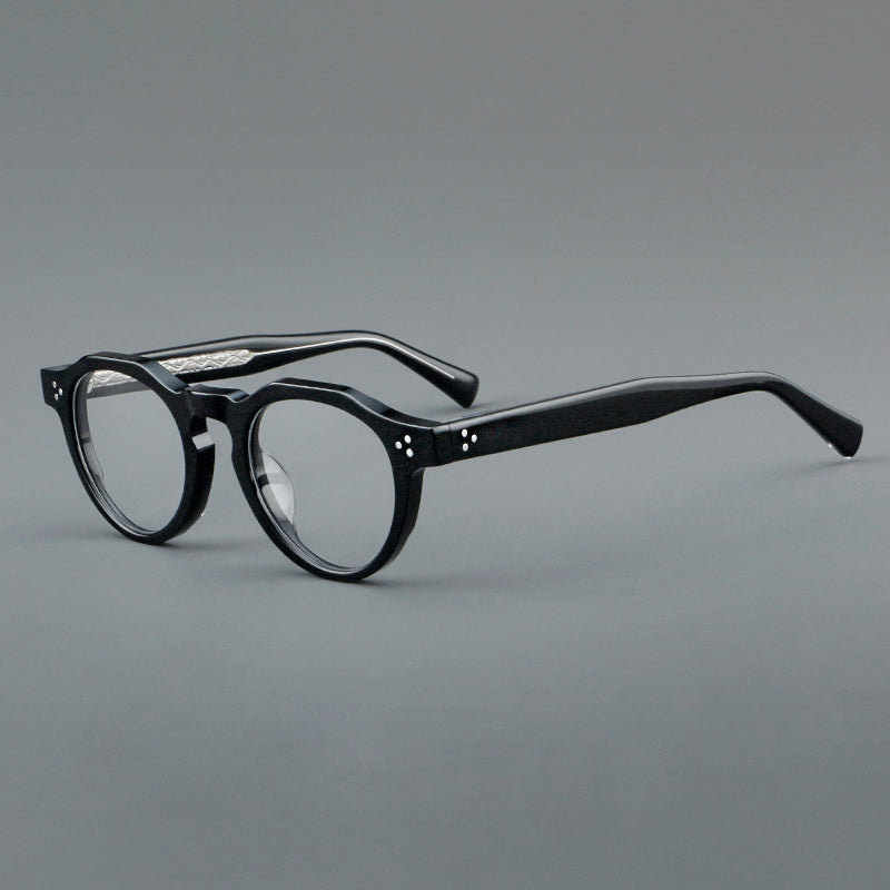 Montura de gafas vintage redondas de acetato con puente de cerradura y detalle de tres remaches