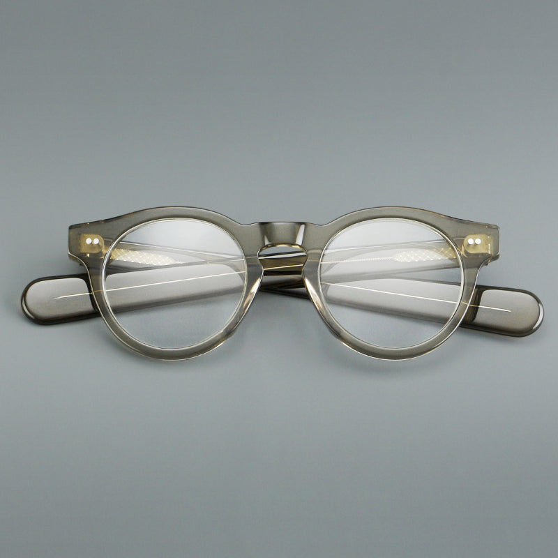 Monturas de gafas redondas de acetato con aros gruesos y varillas anchas rectas