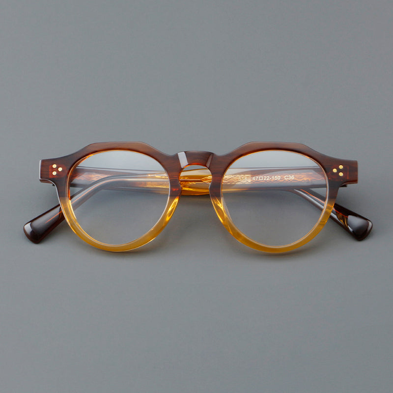 Monturas de gafas redondas retro de acetato con puente de cerradura elevado y remaches en las esquinas