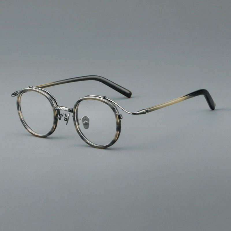 Montura de gafas redondas retro de acetato con puente de metal fino y detalles laterales