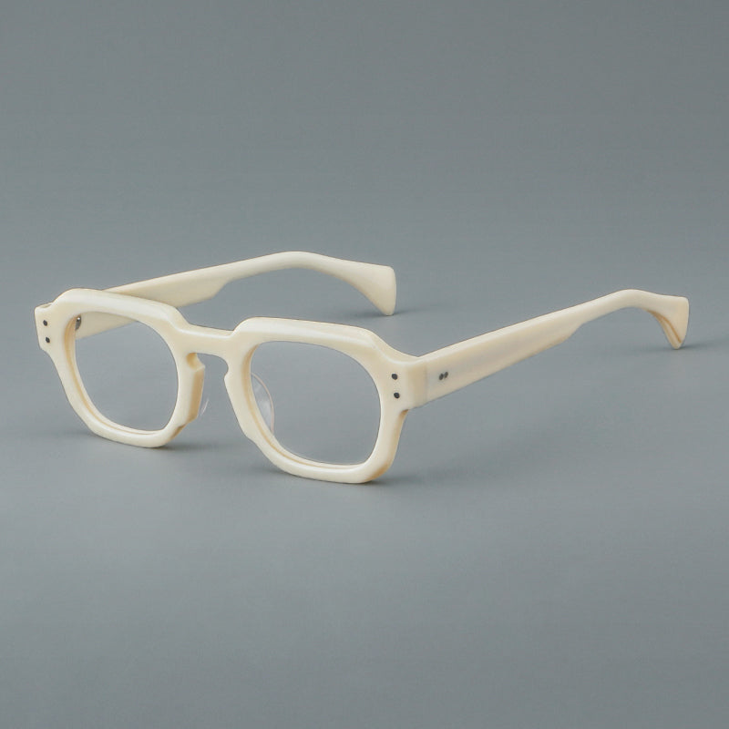 Monturas de gafas retro cuadradas de acetato con bordes gruesos esculpidos y remaches en las esquinas