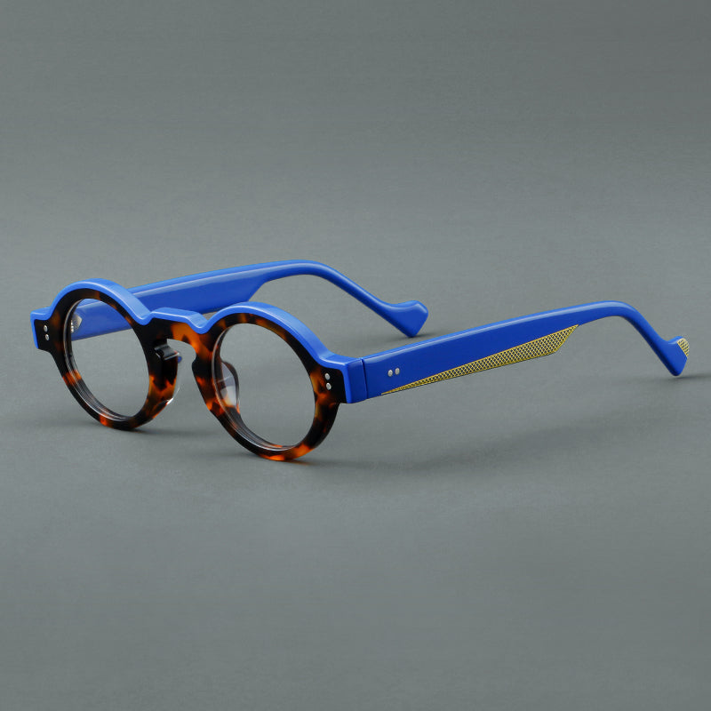 Montura de gafas retro ovalada de acetato, aros completos profundos y varillas anchas
