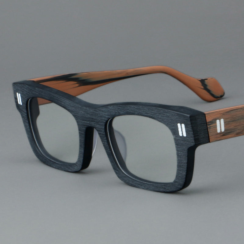 Monturas de gafas retro rectangulares de acetato con cejas gruesas y detalles de doble barra en las esquinas