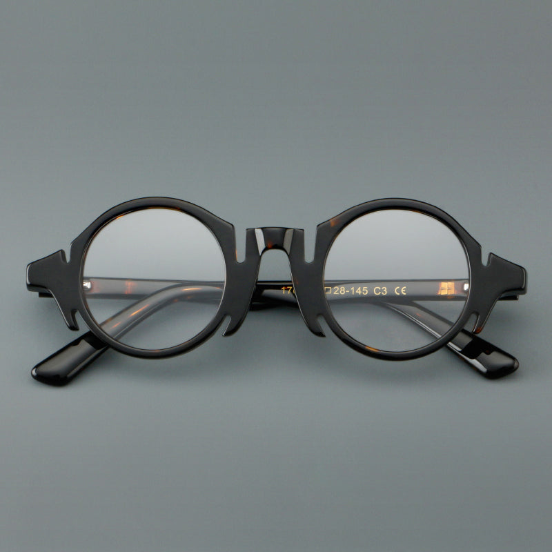 Montura de gafas redondas de acetato con efecto de madera, frente esculpido y patillas moldeadas
