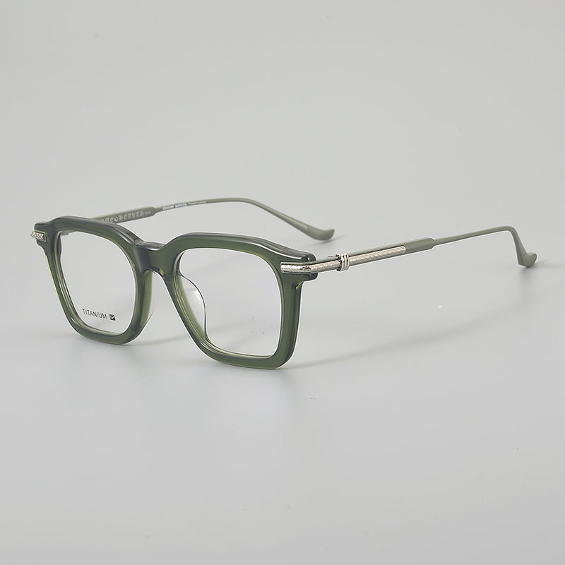 Monturas de gafas rectangulares retro con línea superior definida y patillas de metal delgadas