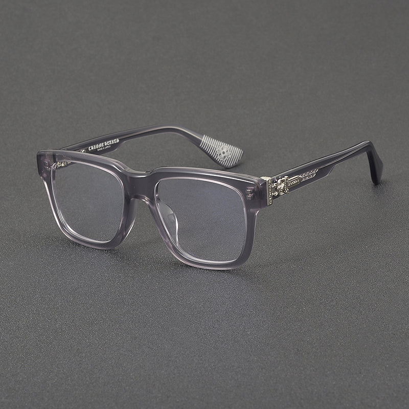 Monturas de gafas rectangulares de acetato con aros completos esculpidos y paneles decorativos en las varillas