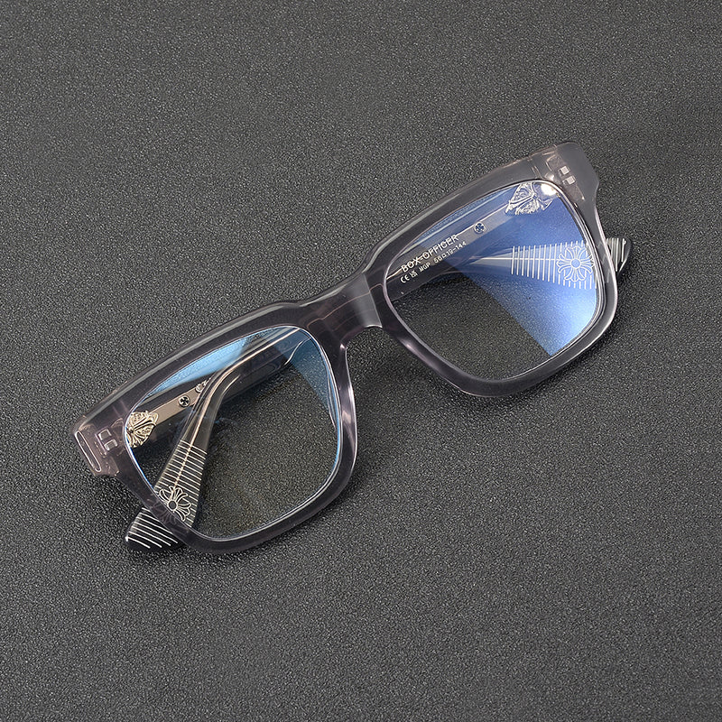 Monturas de gafas rectangulares de acetato con aros completos esculpidos y paneles decorativos en las varillas