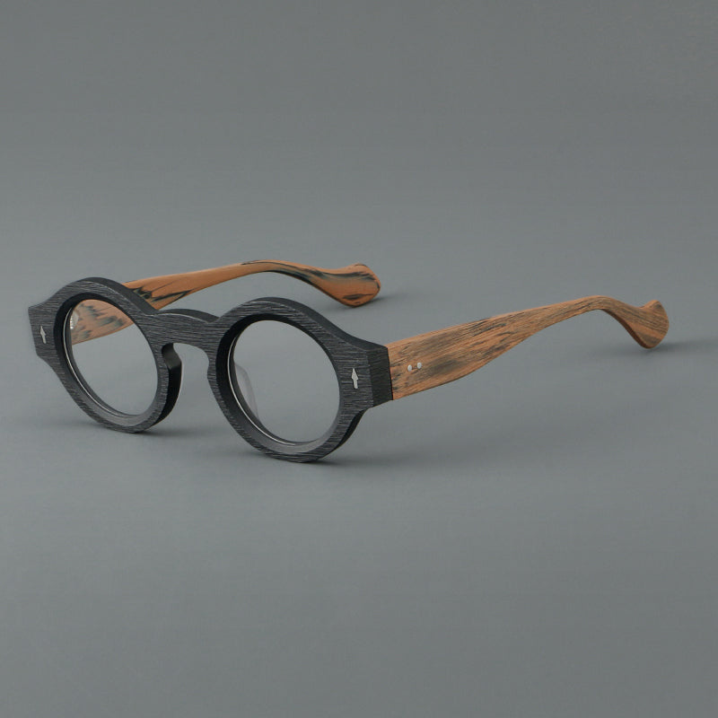 Monturas de gafas retro redondas de acetato, bordes circulares gruesos y detalles laterales esculpidos