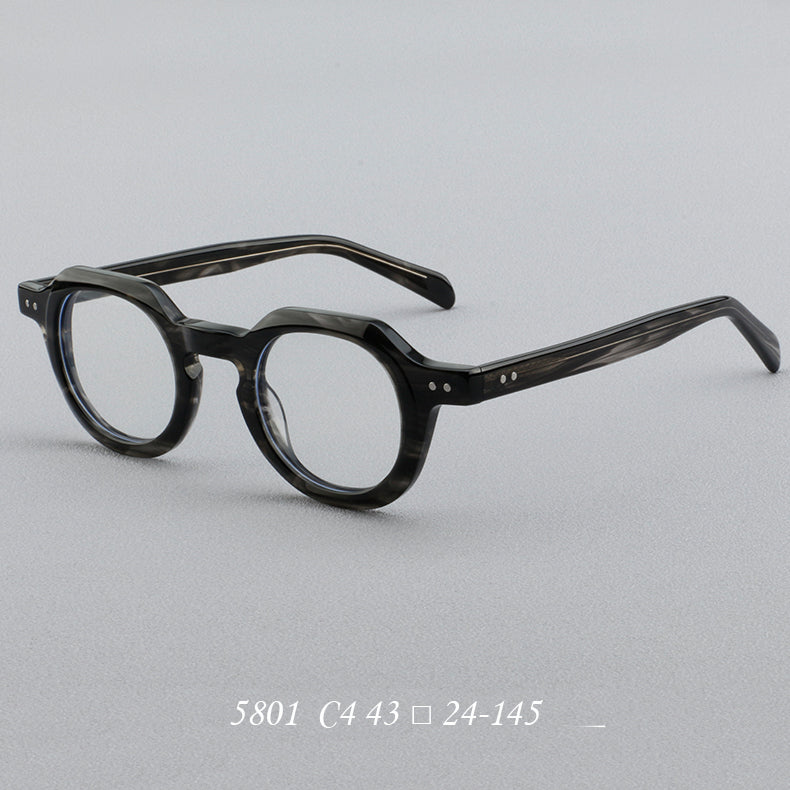Montura de gafas redondas vintage de acetato con puente de cerradura y detalles de remaches cuadrados