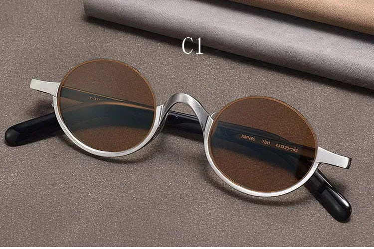 
Gafas de sol ovaladas retro polarizadas | Titanio puro | Marrón oscuro - plata