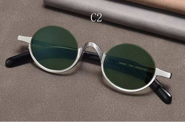 
Gafas de sol ovaladas retro polarizadas | Titanio puro | Marrón oscuro - plata