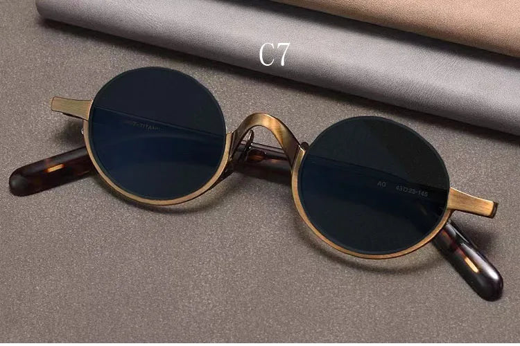 
Gafas de sol ovaladas retro polarizadas | Titanio puro | Marrón oscuro