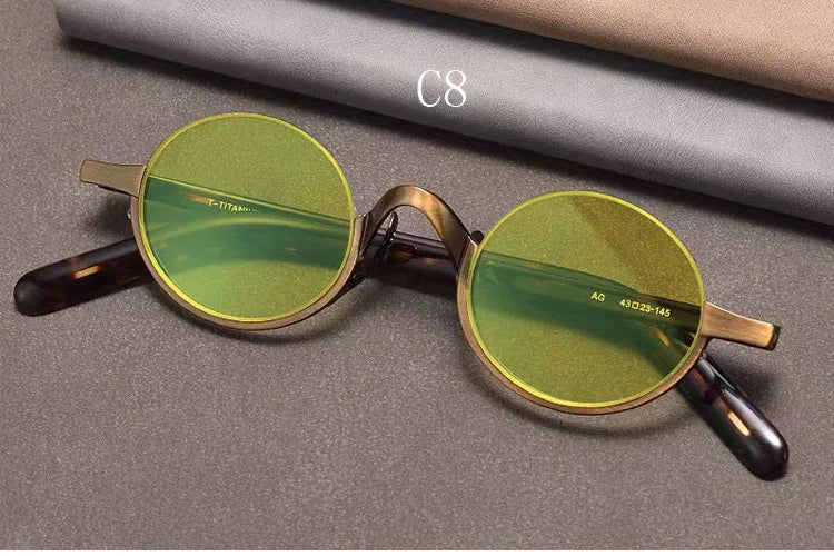 
Gafas de sol ovaladas retro polarizadas | Titanio puro | Marrón oscuro