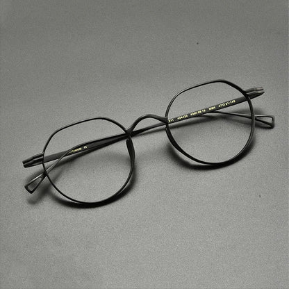 
Montura de gafas ópticas redondas de titanio vintage, ligera y de ajuste pequeño