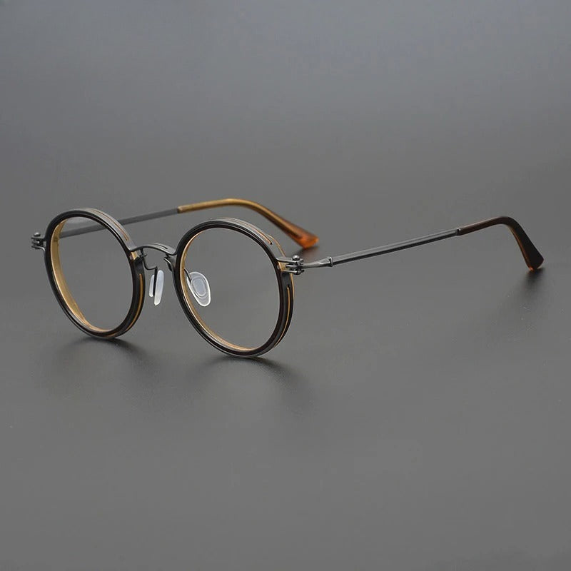 
Montura de gafas ópticas redondas de estilo vintage en titanio puro ultraligero