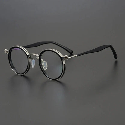 
Montura de gafas ópticas redondas de estilo vintage en titanio puro ultraligero