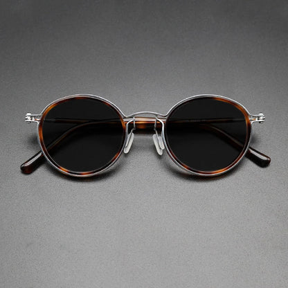 
Gafas de sol redondas vintage polarizadas con protección UV400 y detalle de titanio - Imagen 5
