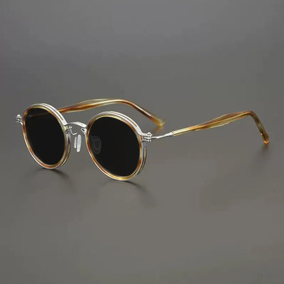 
Gafas de sol redondas vintage polarizadas con protección UV400 y detalle de titanio