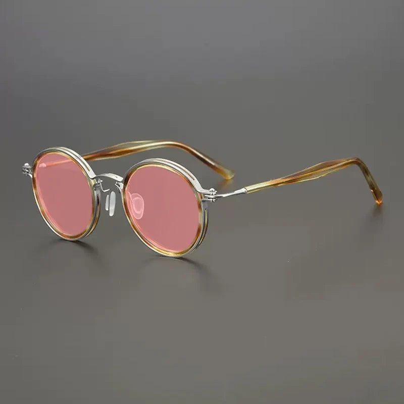 
Gafas de sol redondas vintage polarizadas con protección UV400 y detalle de titanio - Marrón