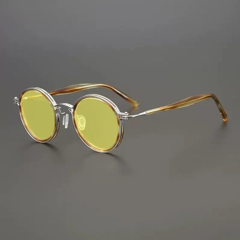 
Gafas de sol redondas vintage polarizadas con protección UV400 y detalle de titanio