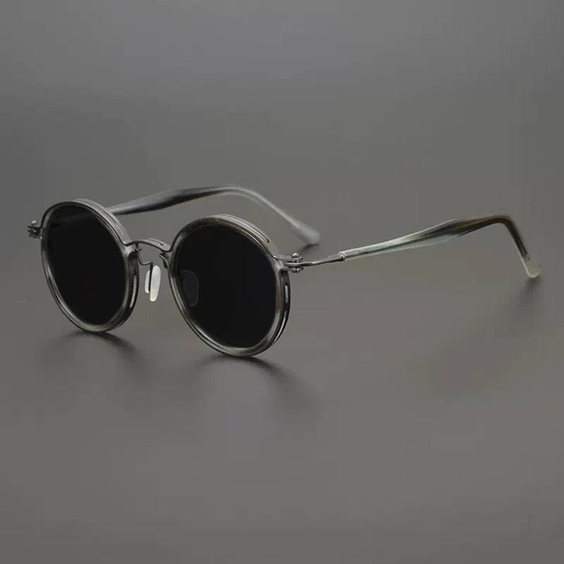 
Gafas de sol redondas vintage polarizadas con protección UV400 y detalle de titanio