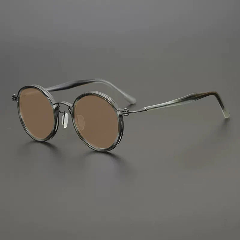 
Gafas de sol redondas vintage polarizadas con protección UV400 y detalle de titanio