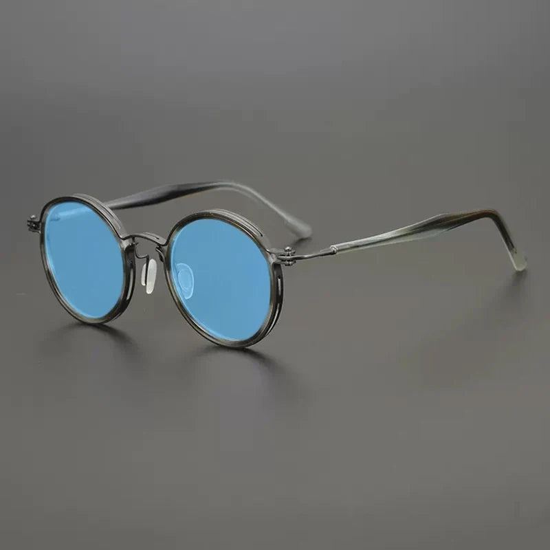 
Gafas de sol redondas vintage polarizadas con protección UV400 y detalle de titanio - Gris