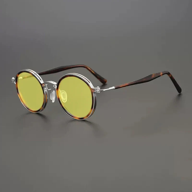 
Gafas de sol redondas vintage polarizadas con protección UV400 y detalle de titanio - Carey plateado