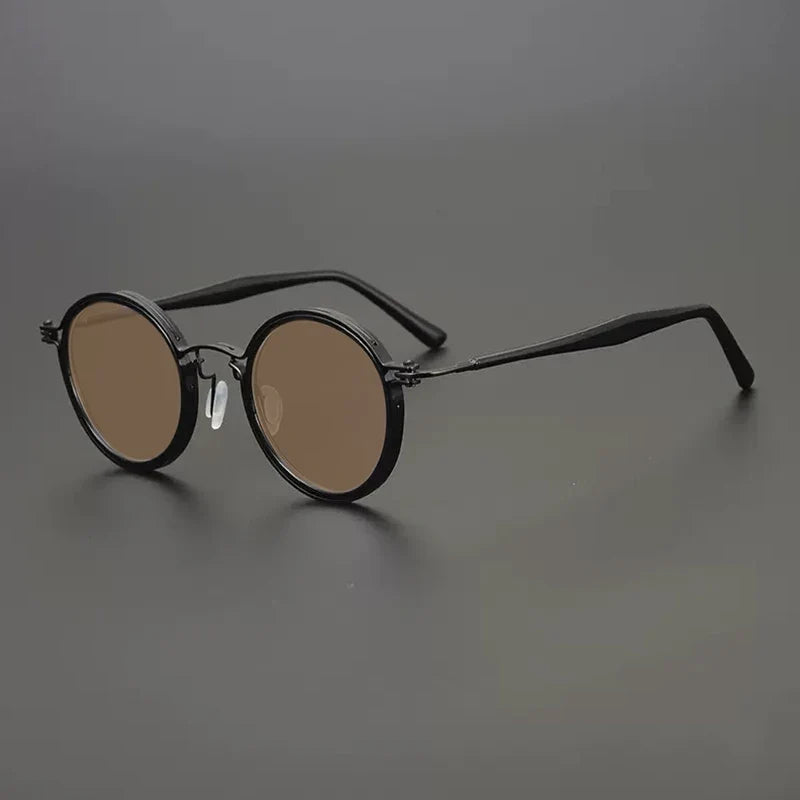 
Gafas de sol redondas vintage polarizadas con protección UV400 y detalle de titanio