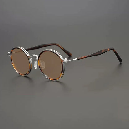 
Gafas de sol redondas vintage polarizadas con protección UV400 y detalle de titanio - Imagen 23