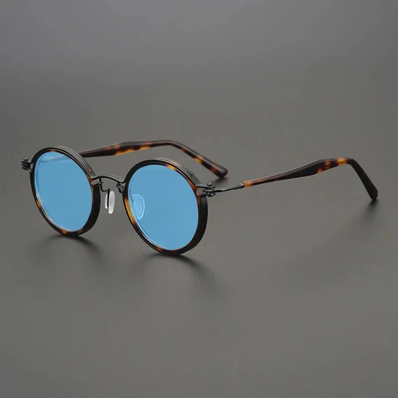 
Gafas de sol redondas vintage polarizadas con protección UV400 y detalle de titanio - Carey