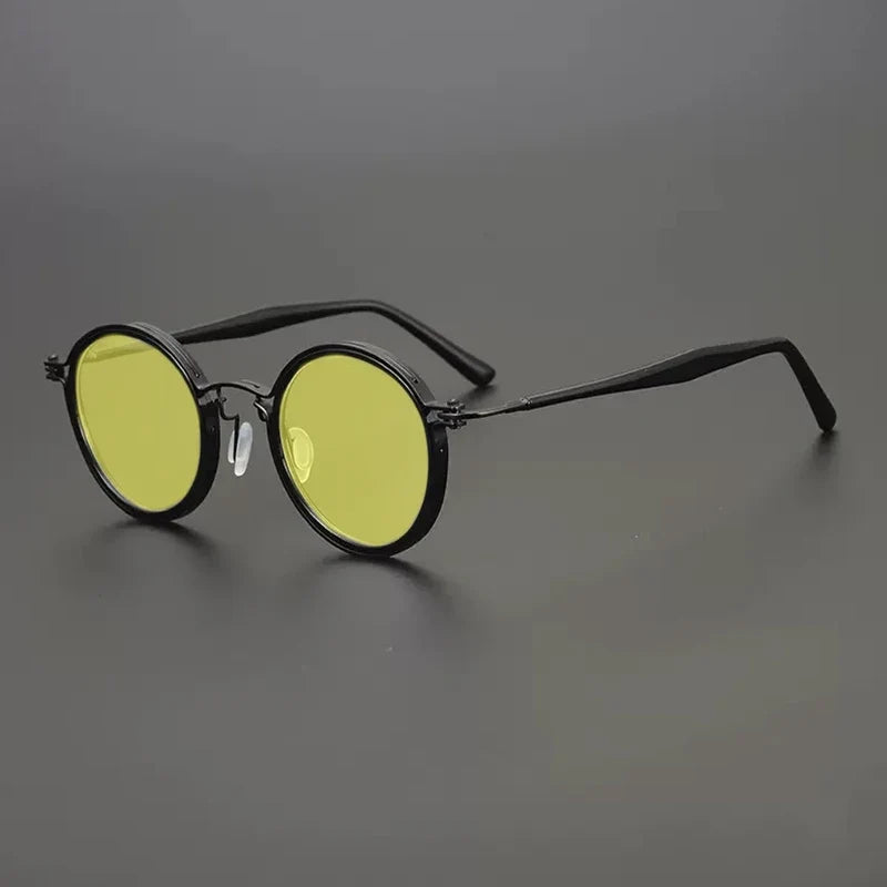 
Gafas de sol redondas vintage polarizadas con protección UV400 y detalle de titanio