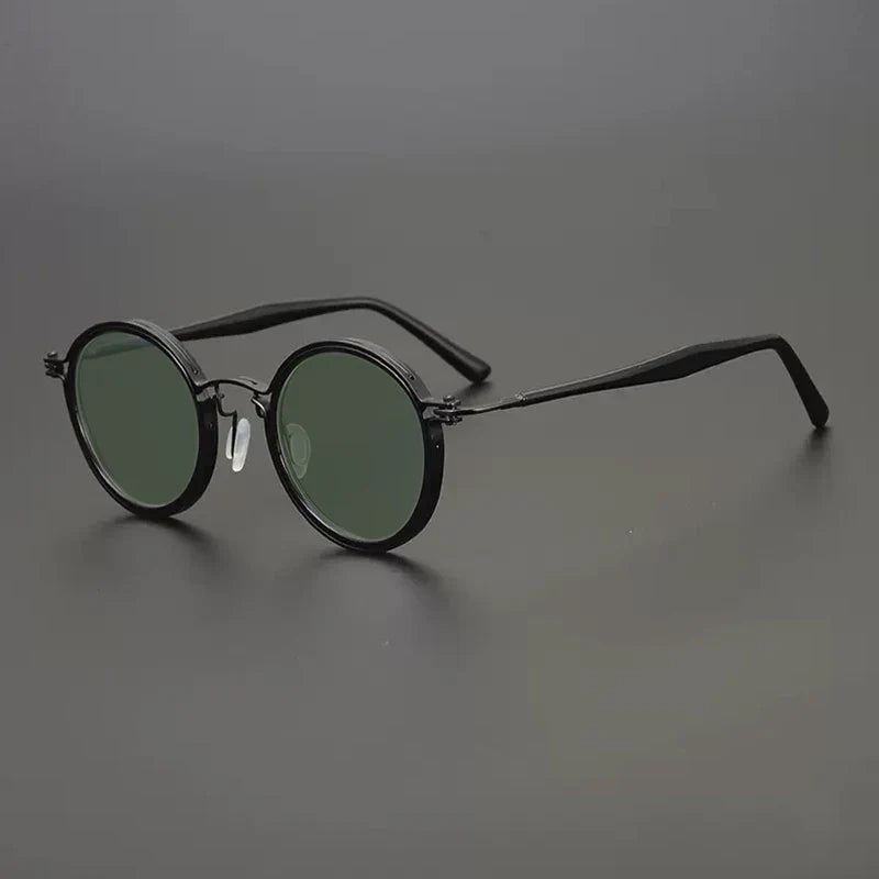 
Gafas de sol redondas vintage polarizadas con protección UV400 y detalle de titanio - Negro