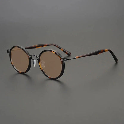
Gafas de sol redondas vintage polarizadas con protección UV400 y detalle de titanio - Imagen 32