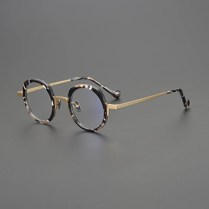 
Montura redonda de titanio con detalles en color - Oro