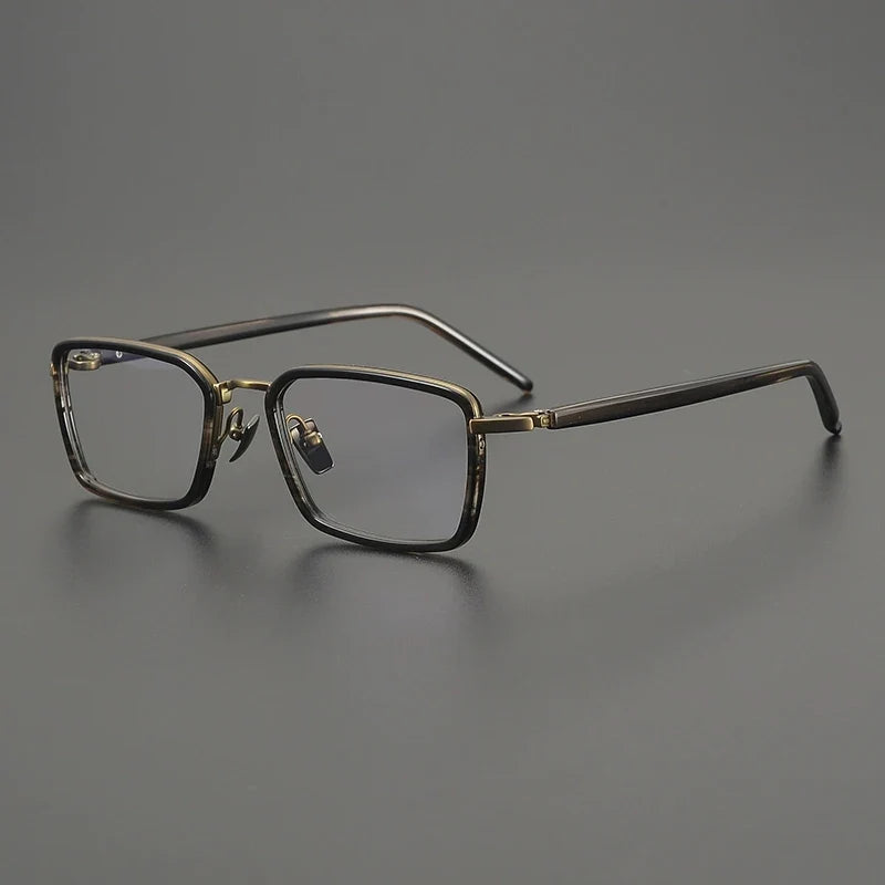 
Montura cuadrada estilo browline de acetato y titanio - Marrón