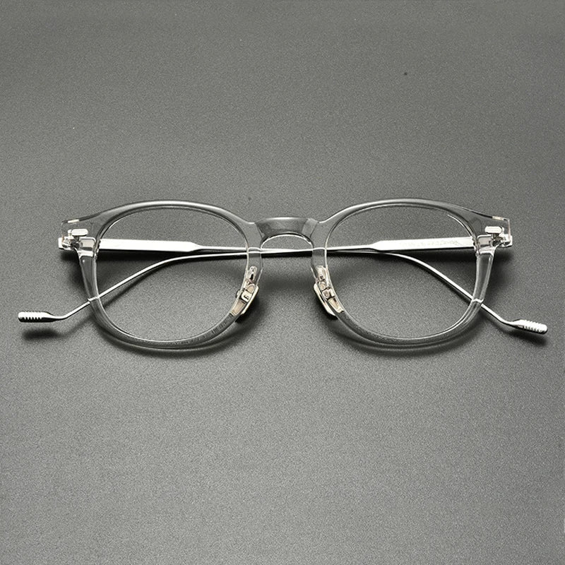 
Montura redonda de acetato y titanio - Gris