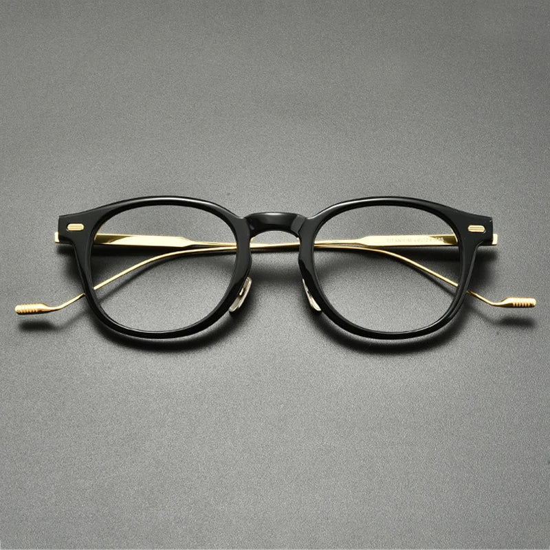 
Montura redonda de acetato y titanio - Negro-Oro