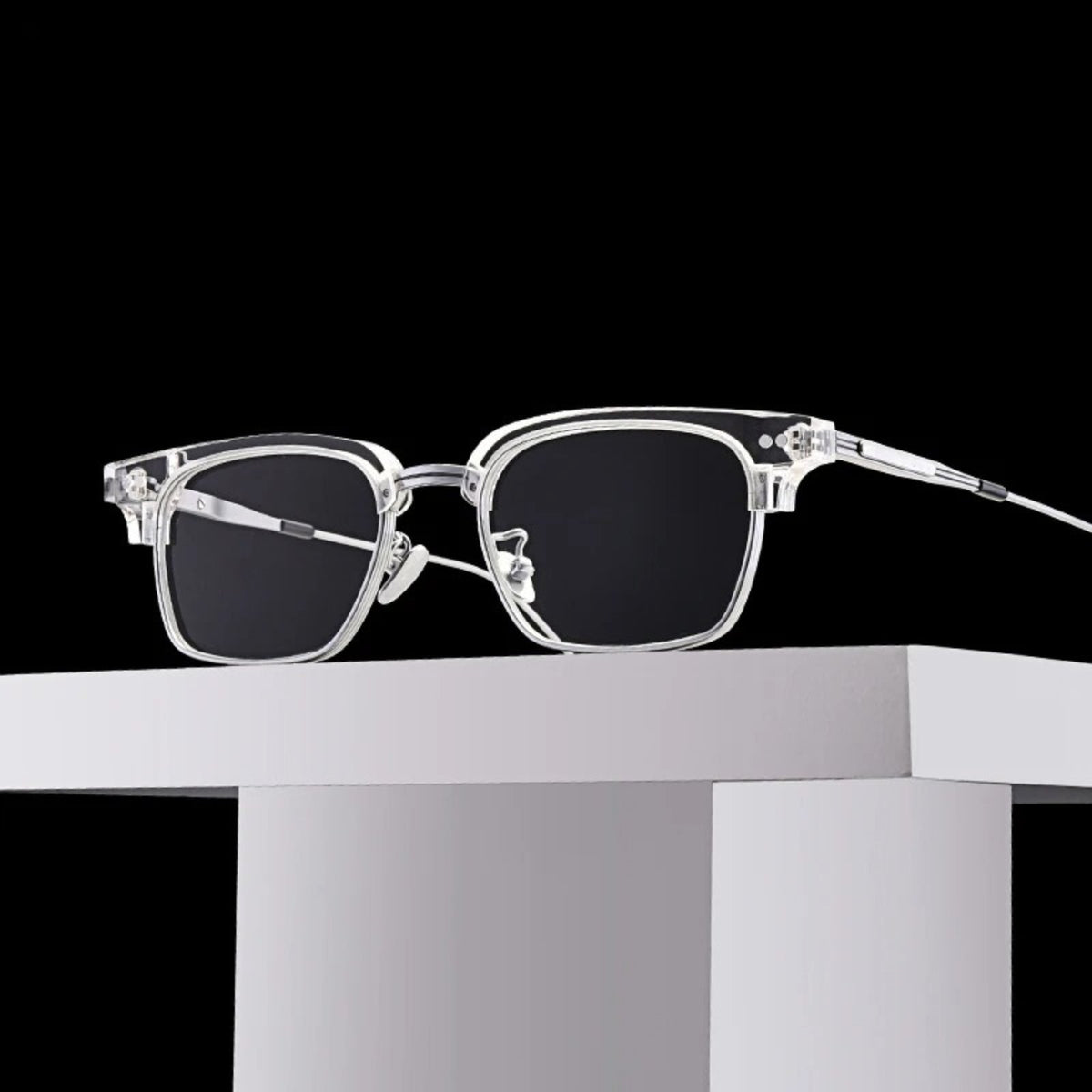 
Montura cuadrada de acetato transparente con medio aro