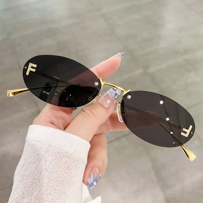 
Gafas de sol ovaladas sin montura de aleación con protección UV400 - Imagen 5